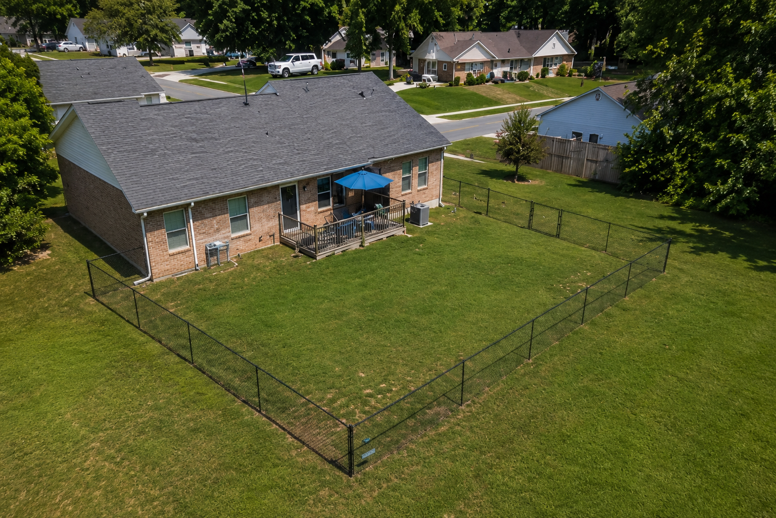 Chain link fence installed by Ground Hog Fencing — example 1